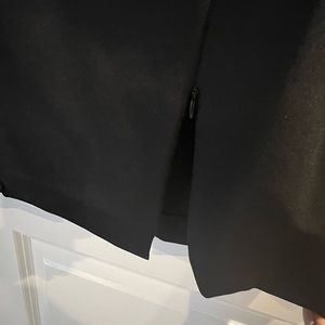 Black V-Neck, Knee Length Dress.  Invisible Back Zipper